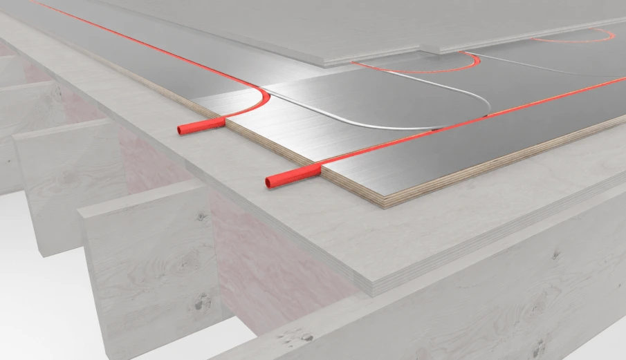 Radiant subfloor panel with red PEX tubing seated in the grooves