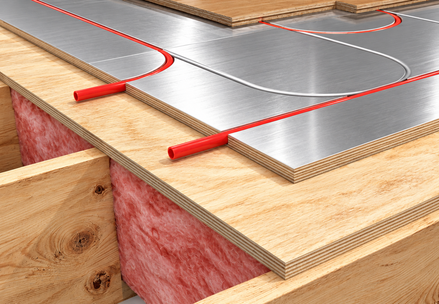 Radiant panel assembly installed over a wood subfloor